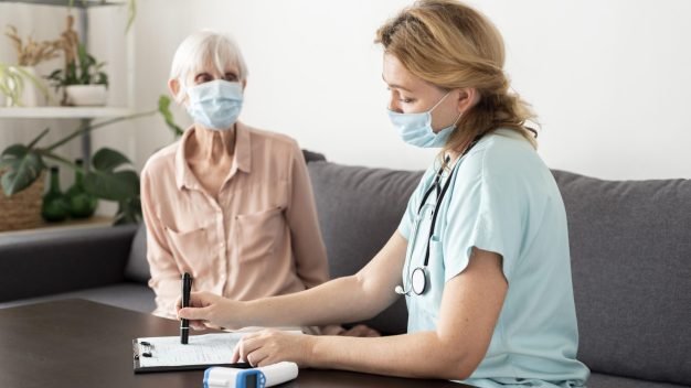 older-woman-getting-her-check-up-with-nurse